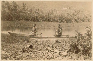 Two Native Women in a Dugout Canoe