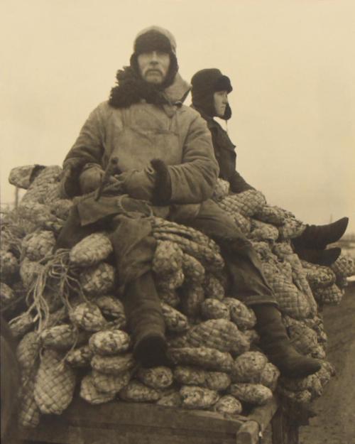 Kirgiz Sitting on Cart of Straw Shoes