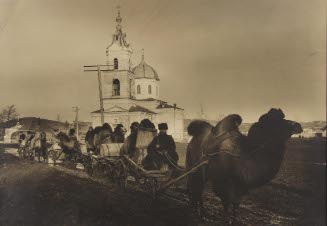 Camels in front of church