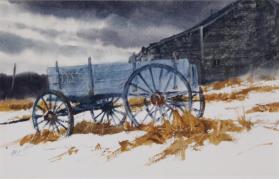 Blue farm wagon and barn