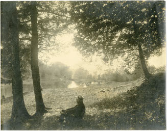 [Man/Pond/Trees]