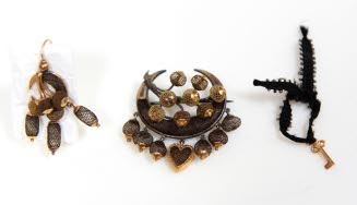 Brooch and one earring