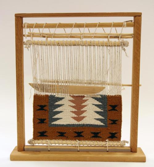 Loom with partial rug