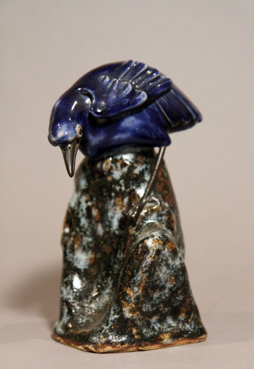 Vase with bird