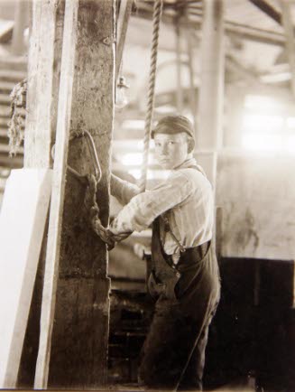 Young Boy Running Machine in Vermont Marble Co., Centre Rutland, Vermont