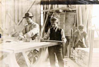 Boys taking away from saws