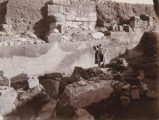 [Excavated ruins with man]