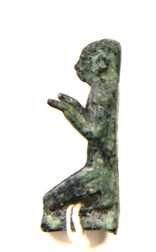 Kneeling priest statuette