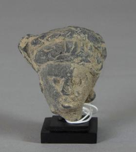 Female head, fragment