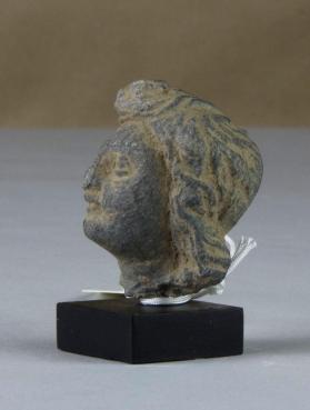 Female head, fragment