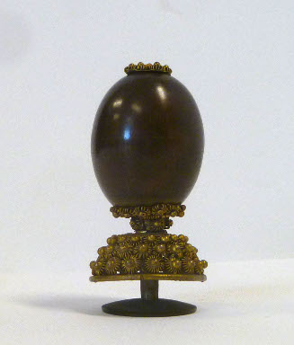 Hat finial