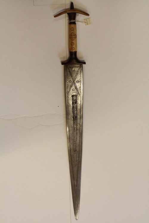 Scabbard, sword and daggers