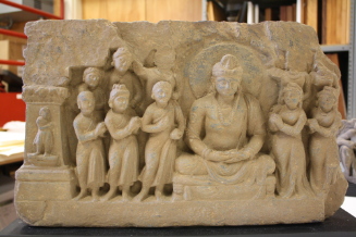 Frieze with Seated Bodhisattva, Possibly Manjushri, and  Attendants