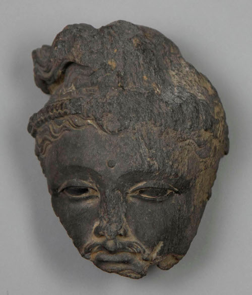 FRAGMENT OF A BODHISATTVA'S FACE, POSSIBLY MAITREYA