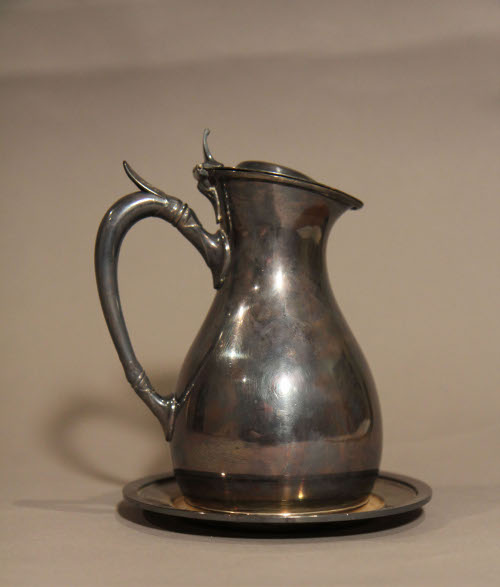 Pitcher with saucer