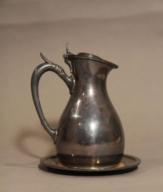 Pitcher with saucer