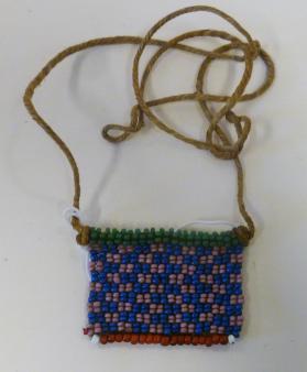 Beaded tab on cord