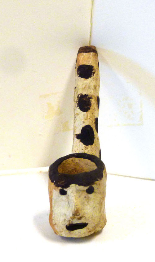 Pipe effigy