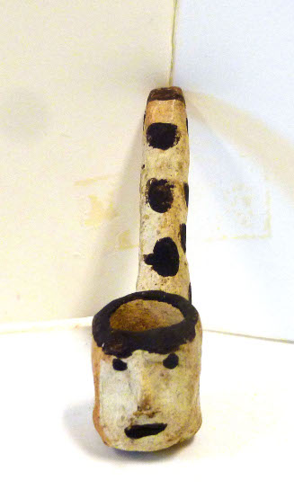 Pipe effigy
