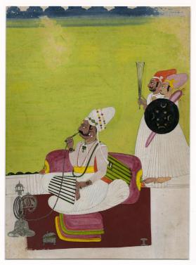 RAJA SMOKES HIS HOOKAH