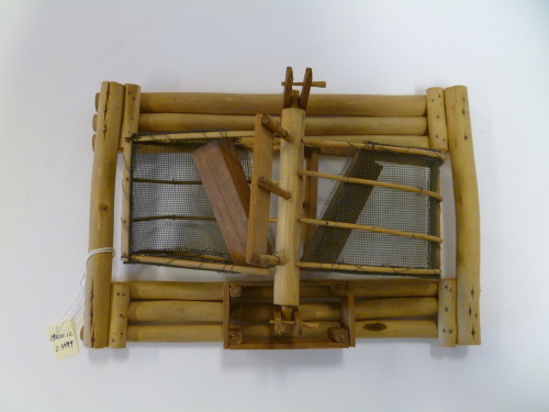 Miniature fish barge with traps