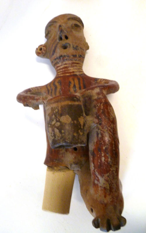 Male figure with drum