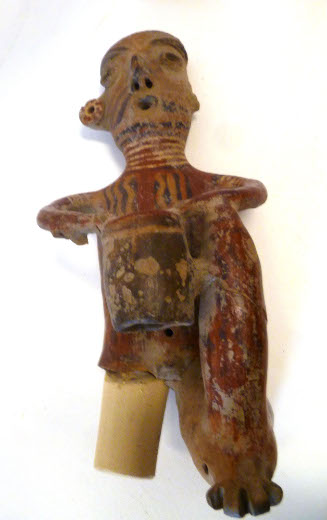 Male figure with drum