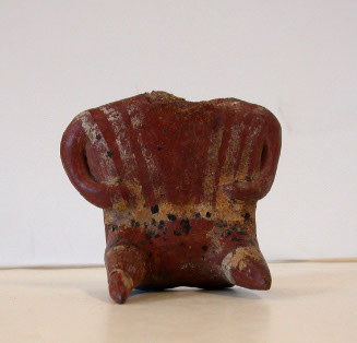 Seated figure, head missing