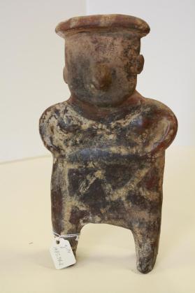 Flat pottery figure