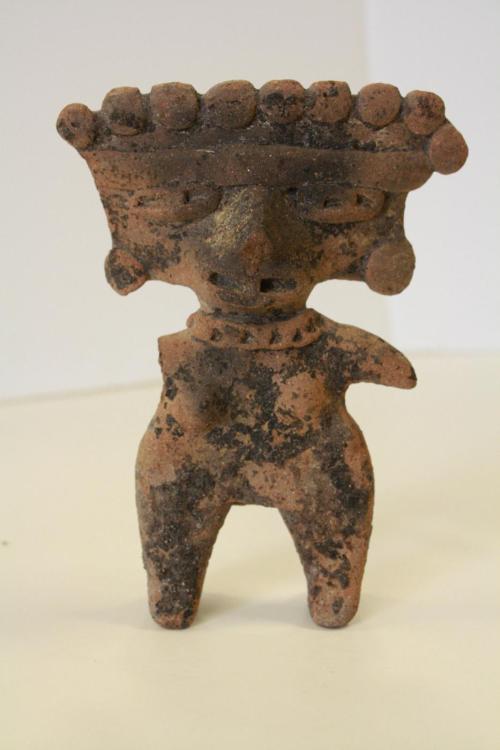 Flat pottery figure