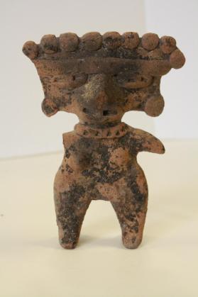 Flat pottery figure