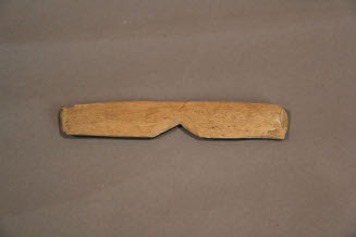 Notched piece of wood