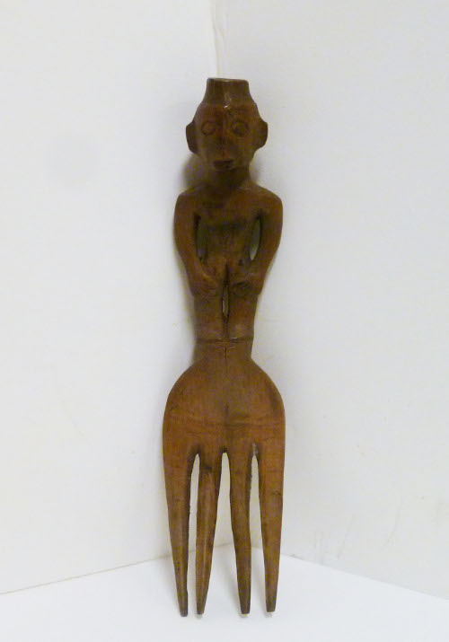Wooden fork with figure