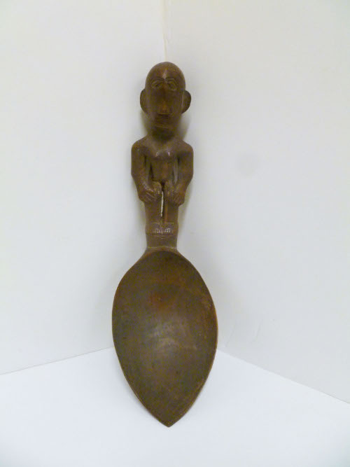 Spoon with carved figure