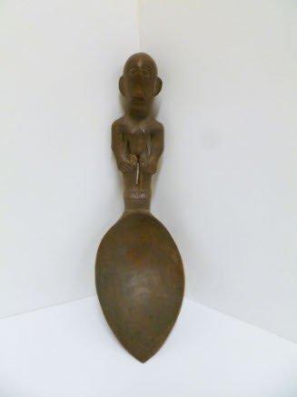 Spoon with carved figure