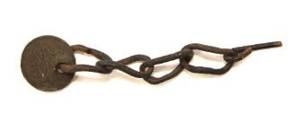 Copper coins on chains